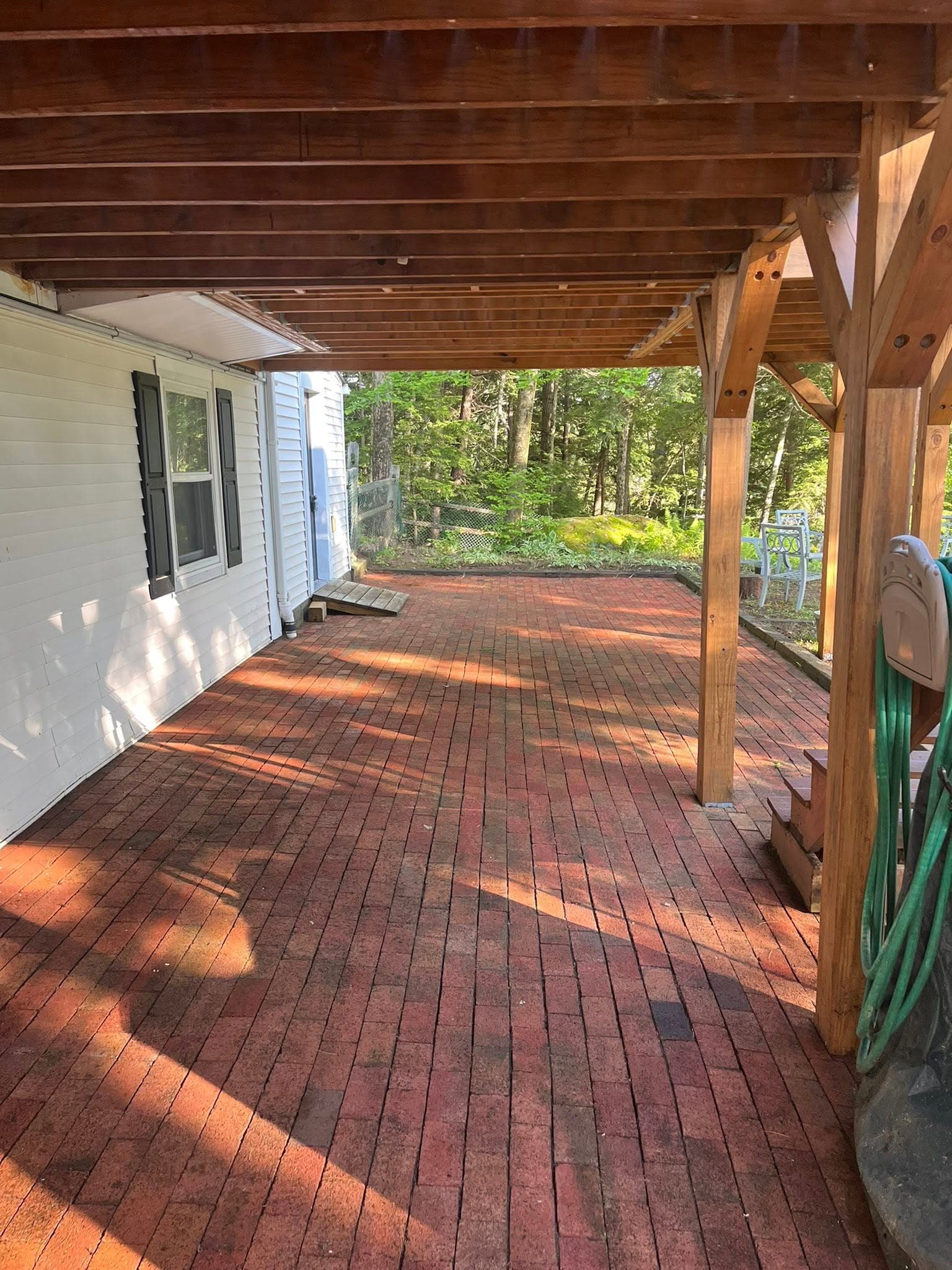 Clean patio surface after pressure washing